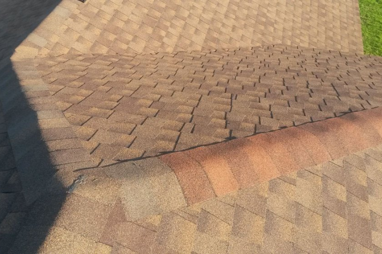 Professional Mabank roofer conducting a roof inspection after a storm