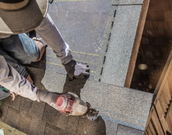 Repairing storm and hail damage on a Burleson roof